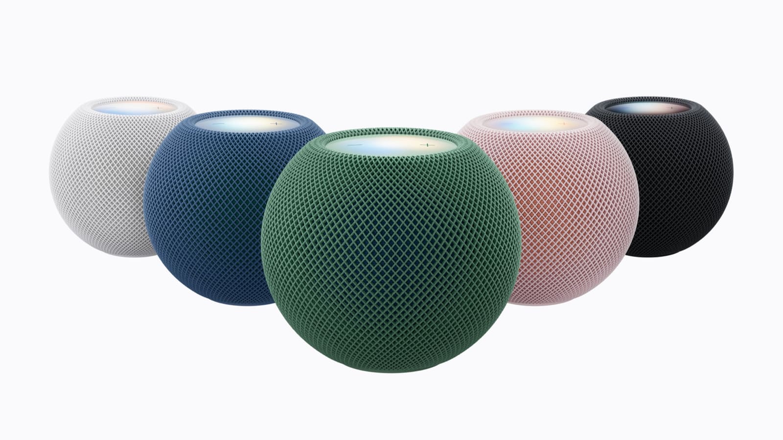 Five HomePod mini 2 speakers in pink, green, blue, white and midnight lined up with glowing tops